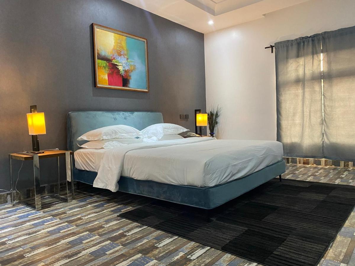 Muse Boutique Hotel Энугу Экстерьер фото