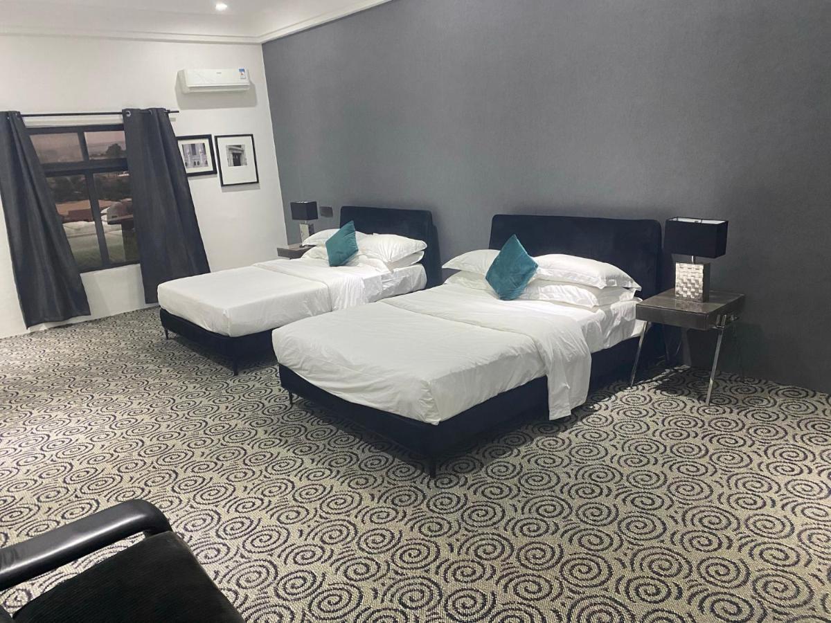 Muse Boutique Hotel Энугу Экстерьер фото