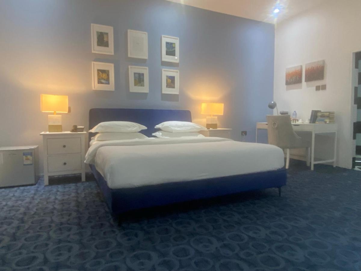 Muse Boutique Hotel Энугу Экстерьер фото