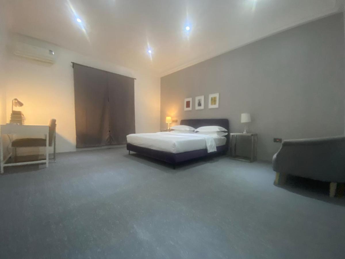 Muse Boutique Hotel Энугу Экстерьер фото