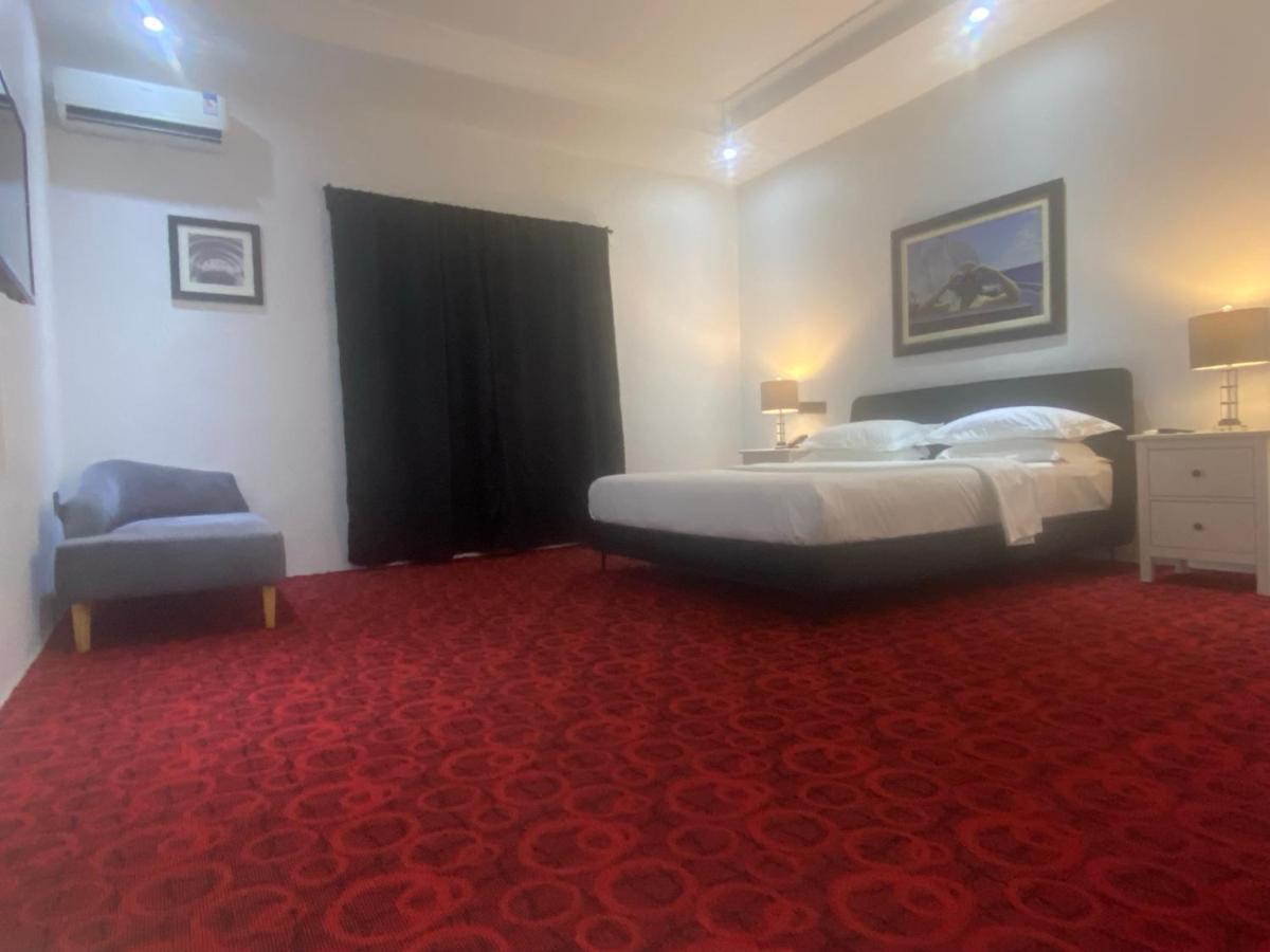 Muse Boutique Hotel Энугу Экстерьер фото
