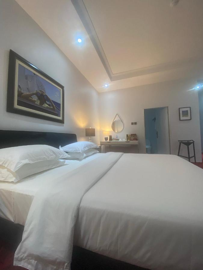 Muse Boutique Hotel Энугу Экстерьер фото