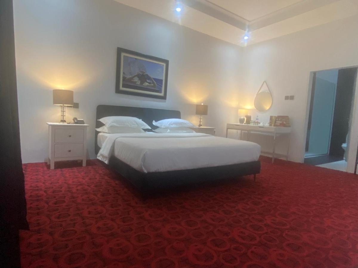 Muse Boutique Hotel Энугу Экстерьер фото