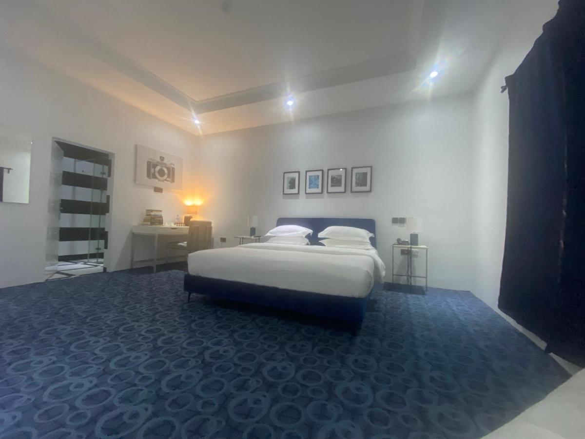 Muse Boutique Hotel Энугу Экстерьер фото