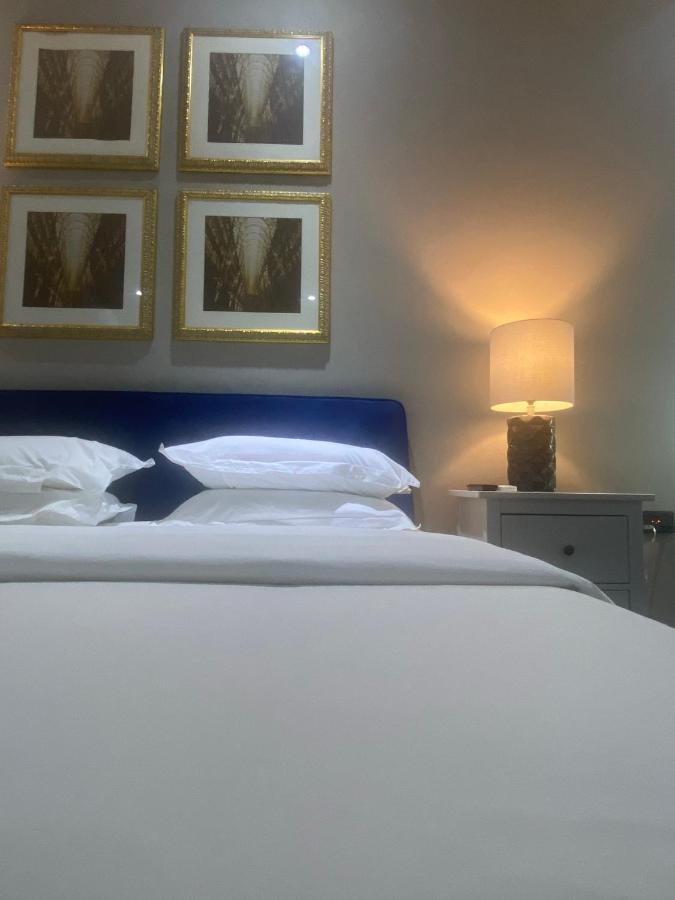 Muse Boutique Hotel Энугу Экстерьер фото