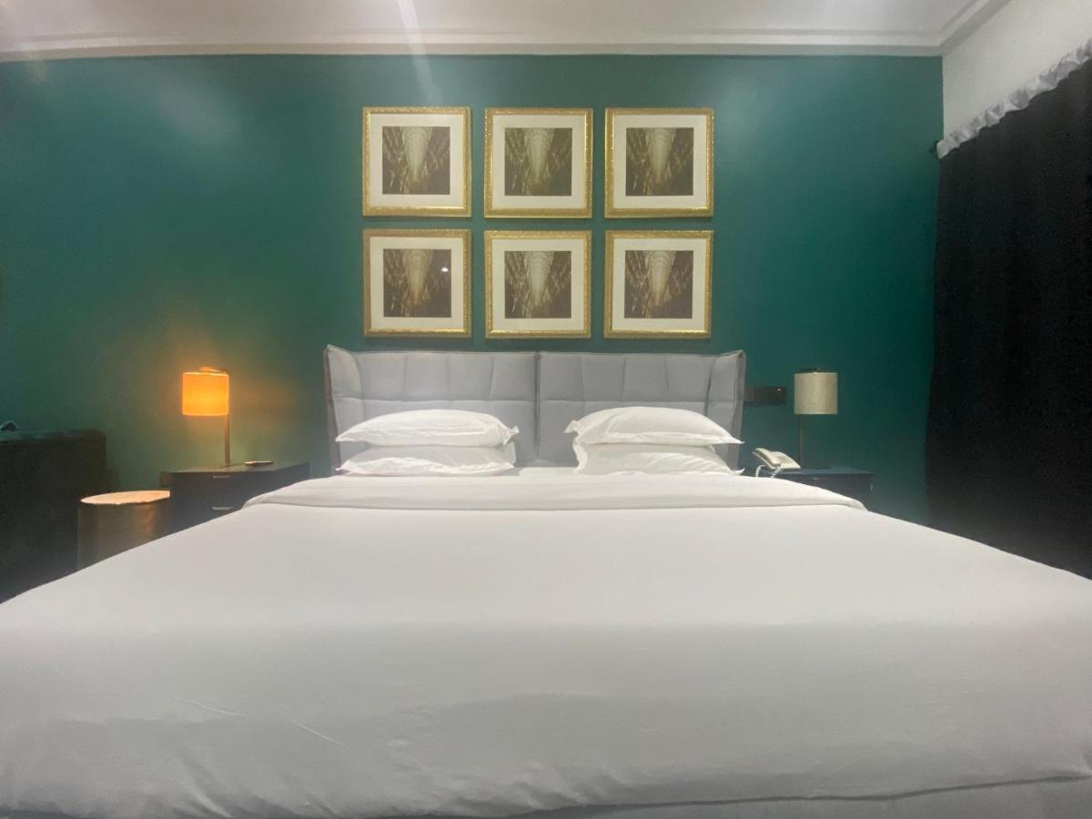 Muse Boutique Hotel Энугу Экстерьер фото