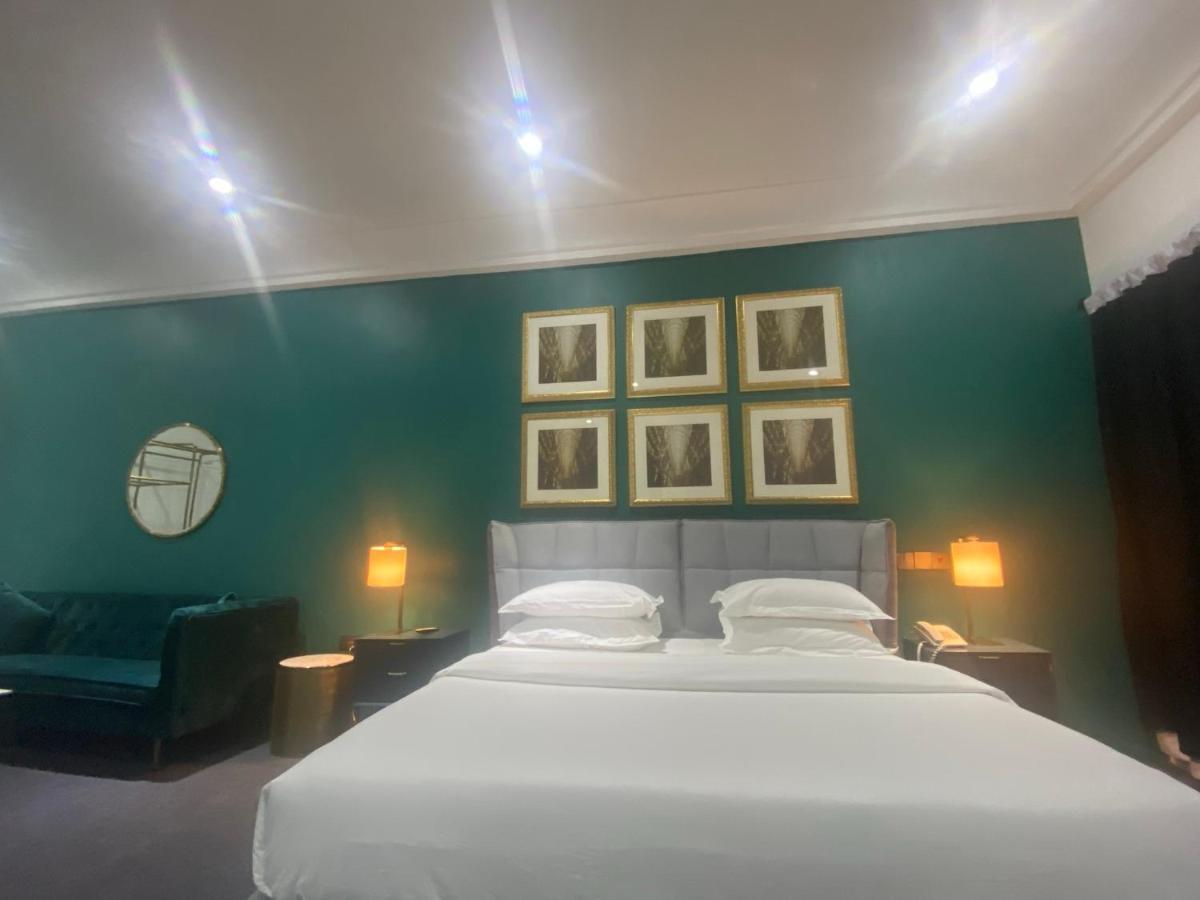 Muse Boutique Hotel Энугу Экстерьер фото