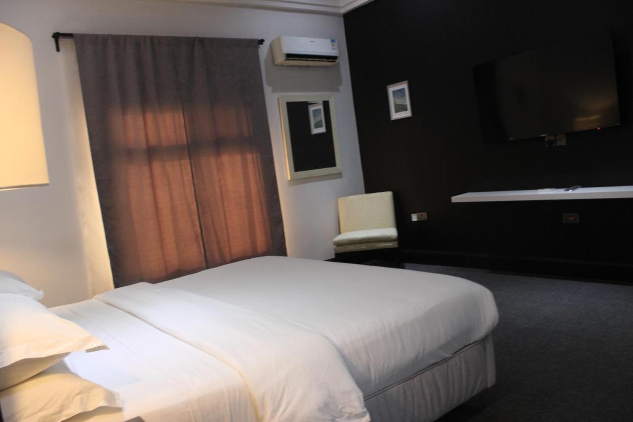 Muse Boutique Hotel Энугу Экстерьер фото